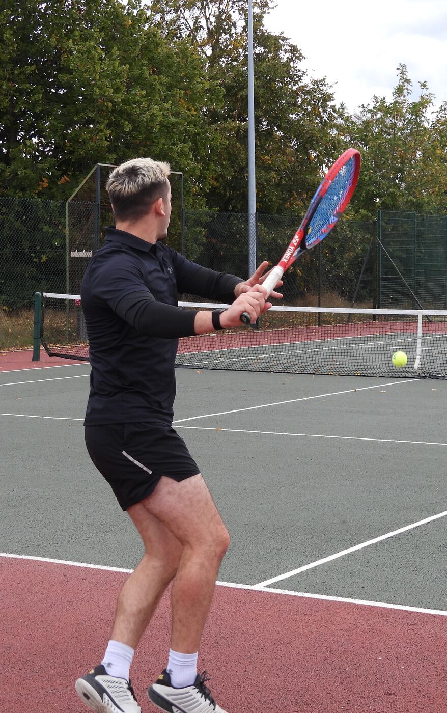 Matt playing tennis